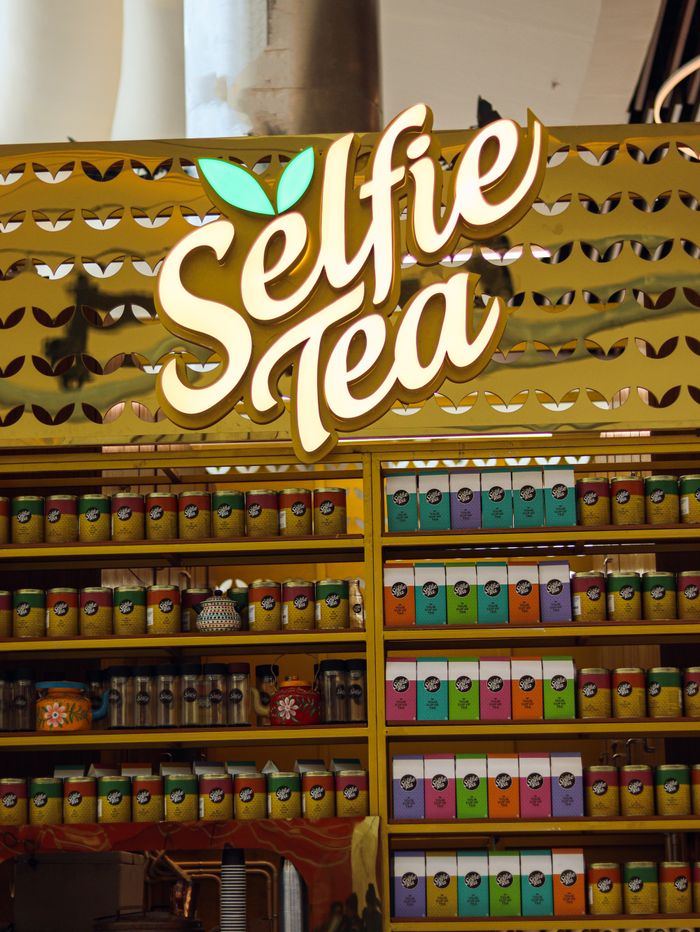 Vibrant tea packaging at Selfie Tea shop in Lulu Mall, Thiruvananthapuram.